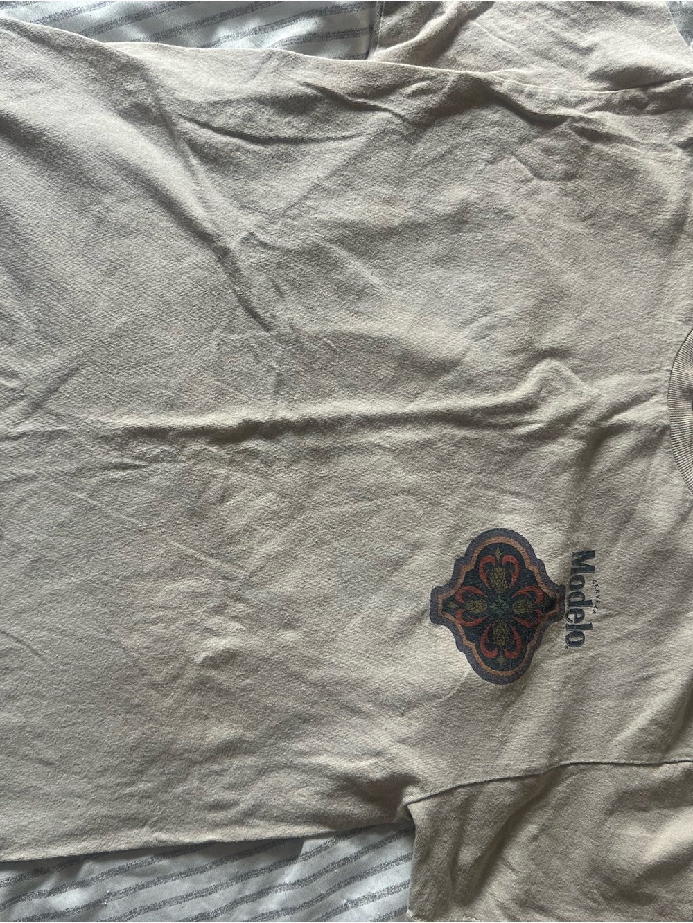 ModelCo Cream Tee with Dark Blue and Gold Logo Panel